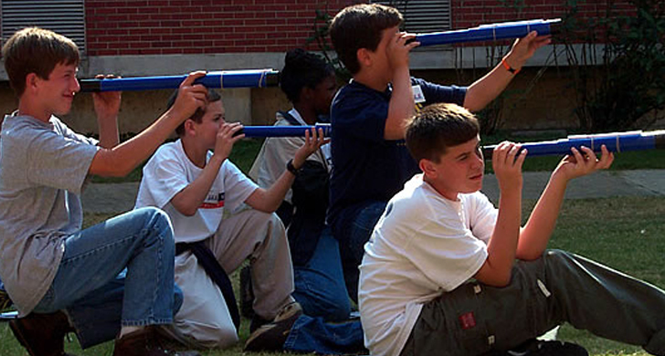 students with telescopes