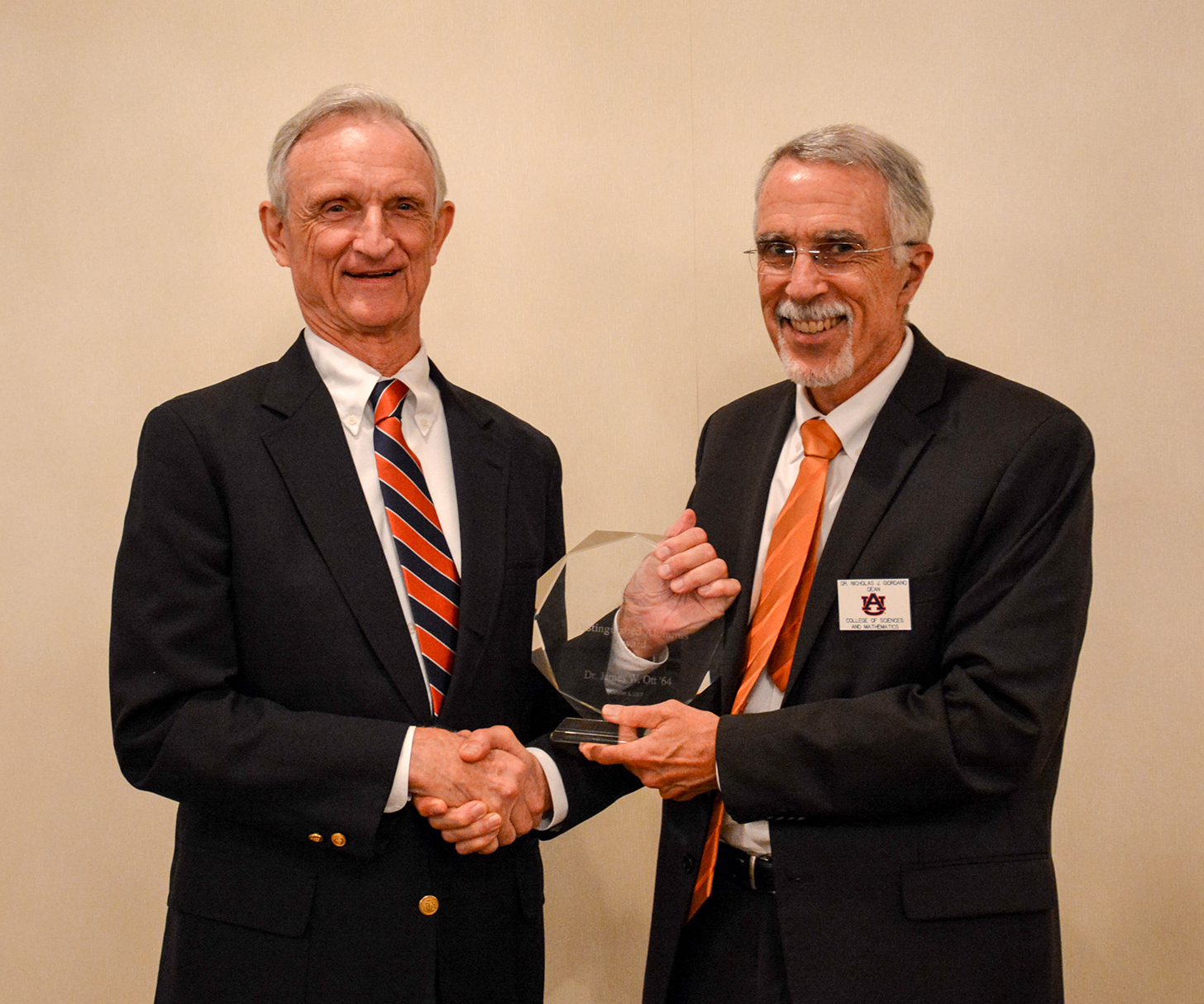 James Ott receiving the COSAM Distinguished Alumnus award from Dean Nicholas Giordano