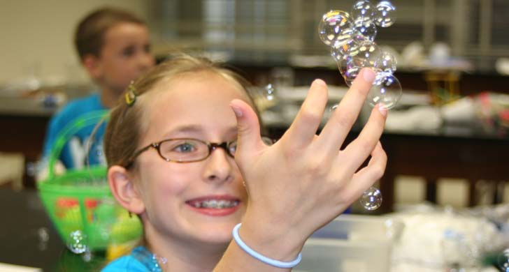 Student with bubbles