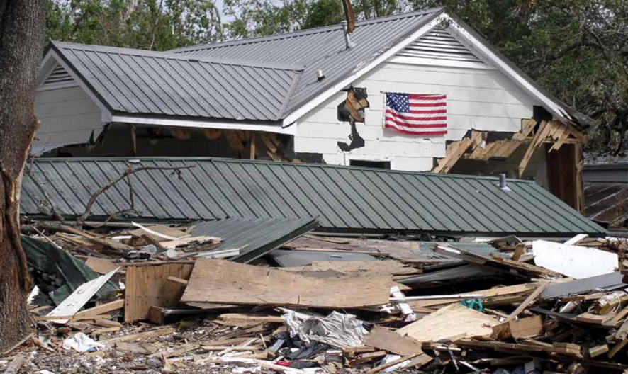 Damaged home left by destruction of hurricane.  