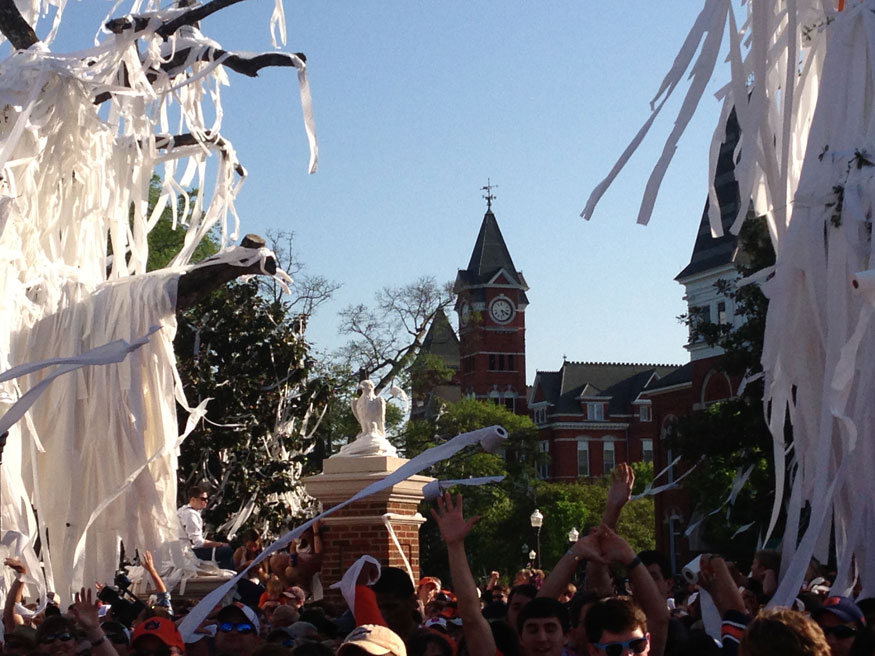 Samford Hall in the background as rolls fly through the air.