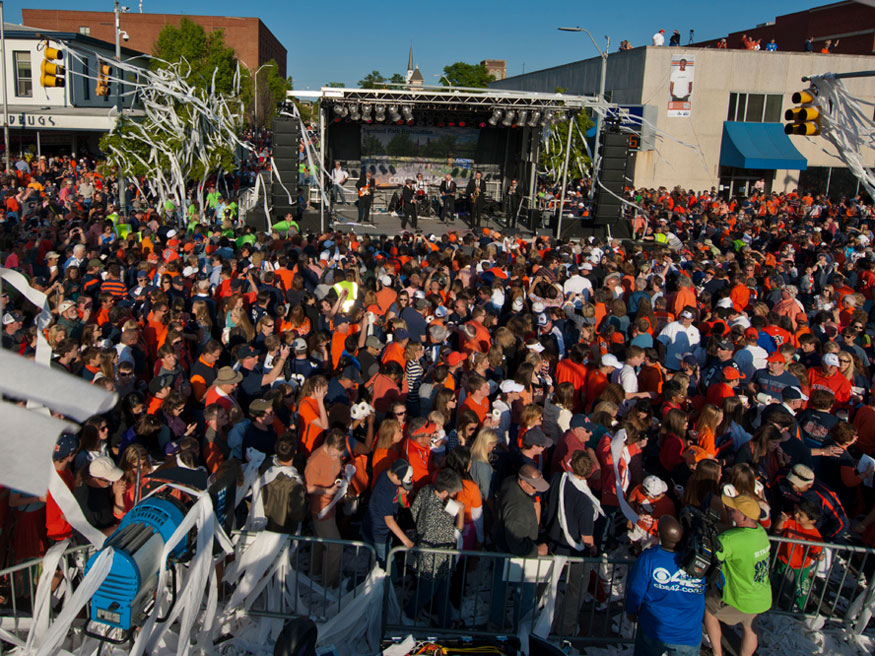 The crowd listens to the band at Toomer's Corner.