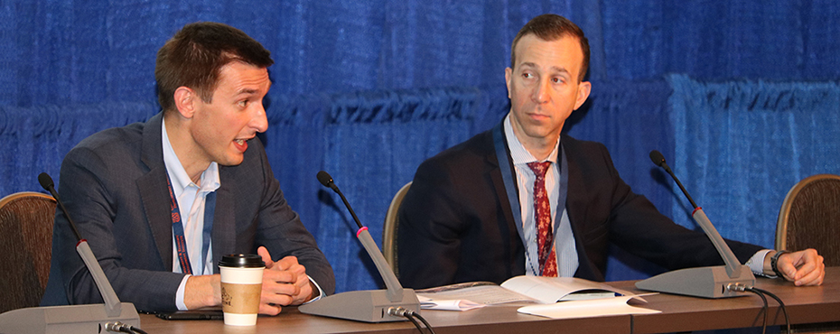 Alex Flachsbart and Richard Shamos discuss hot topics on panel discussion at conference.