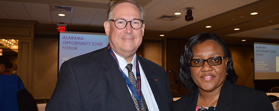 Ralph Foster and Elizabeth Essamuah-Quansah stand for photo during the Alabama Opportunity Zone Forum.
