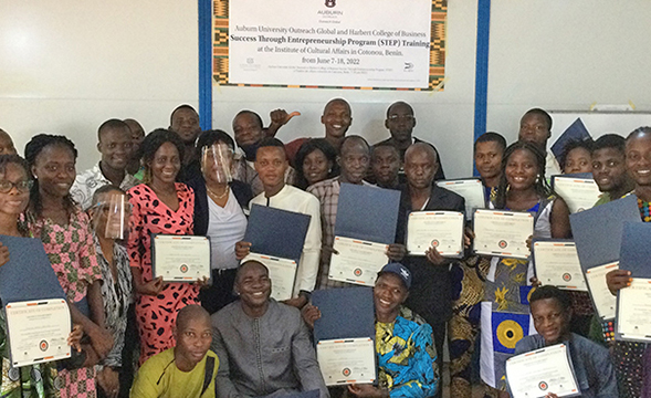 Group photo of people with certificates
