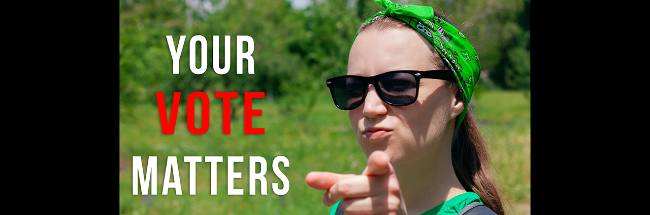 Girl wearing green bandana points at camera and text says Your vote matters