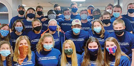 Group photo of campus kitchens student volunteers wearing masks