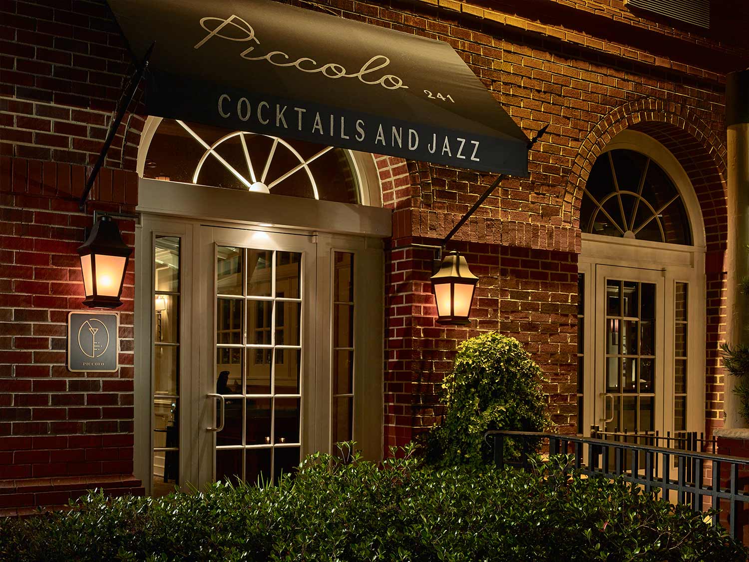 A wooden board with information and pictures tells visitors of the trails.