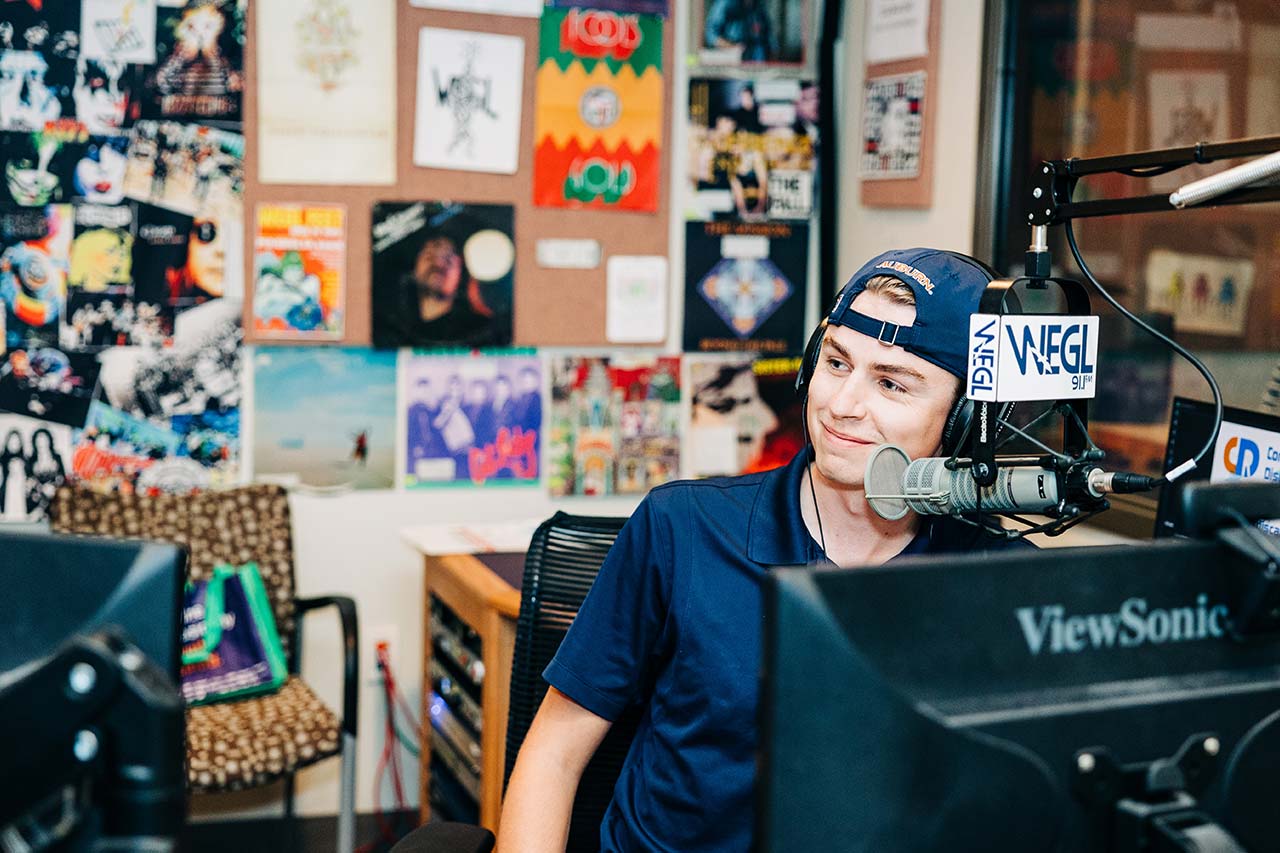 A student talks on the radio