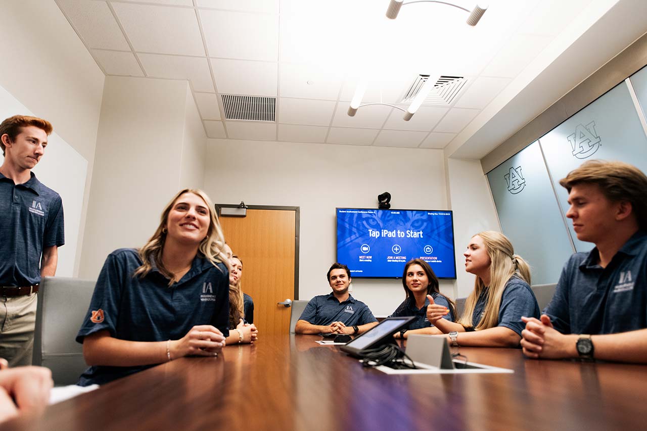 A group of students around a table