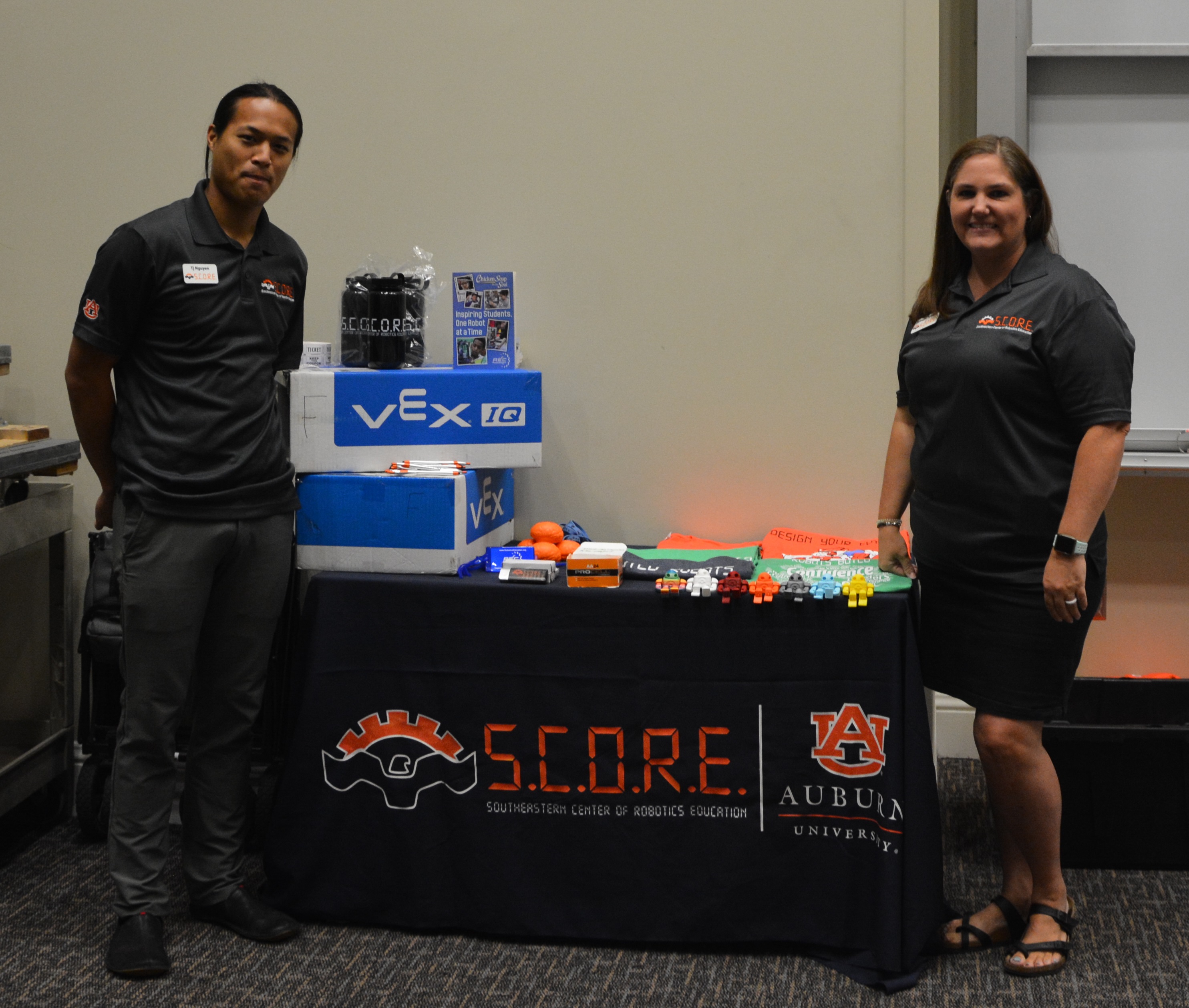 Tj Nguyen and Jennifer Spencer welcome teachers to the Mission 200 training workshop.