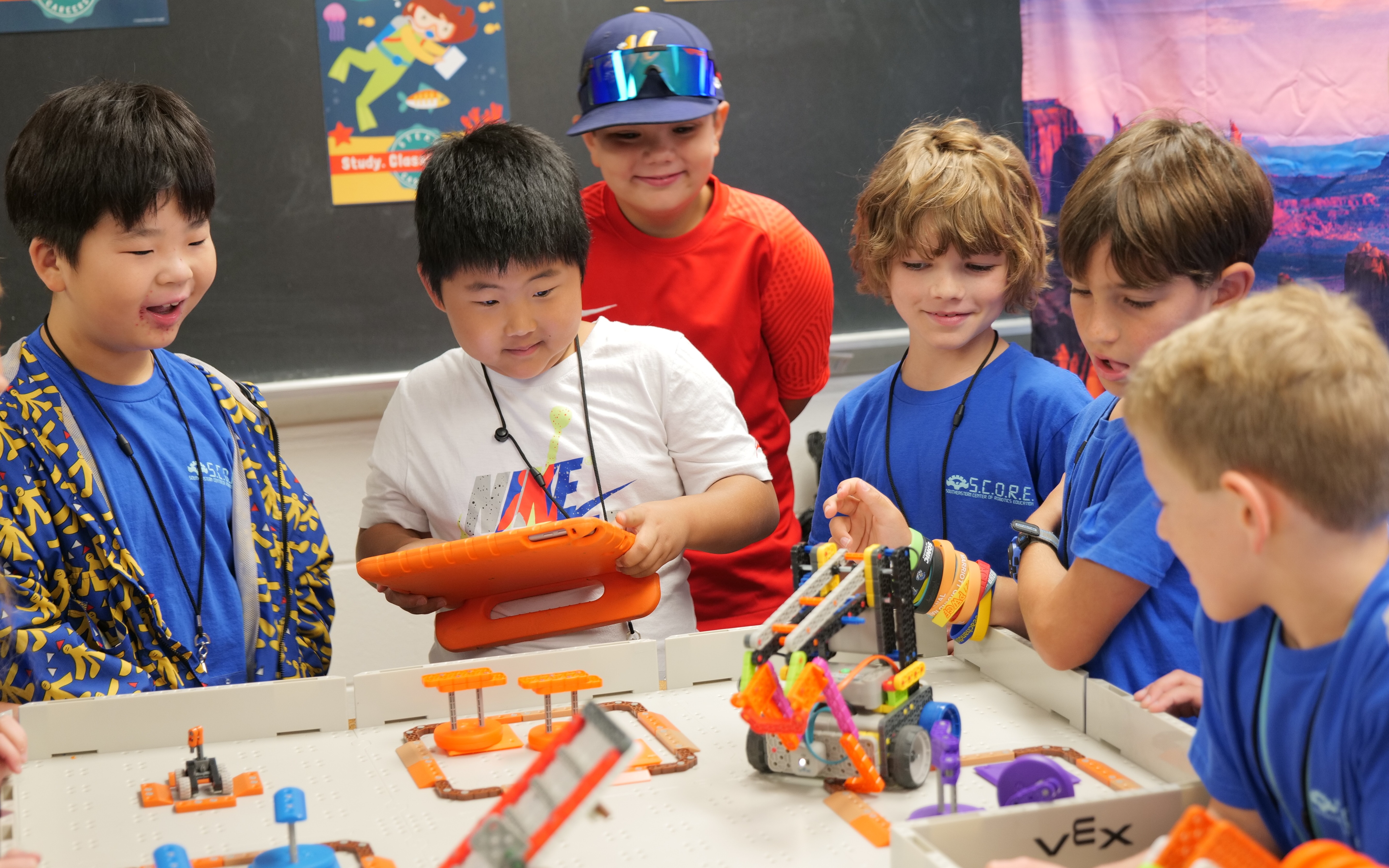 Camp participants compete with VEX robots