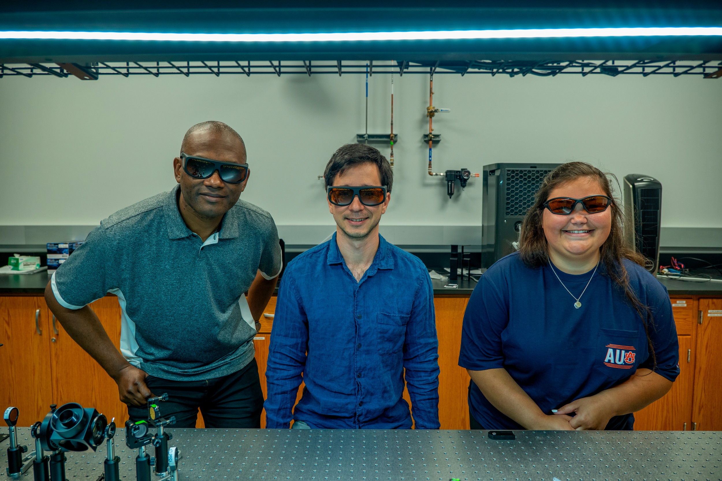 The Ohno Research Group. Paul Ohno is in the center and Angel Gibbons is on the right.