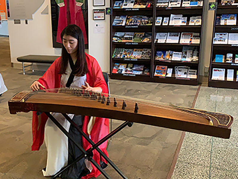 Student performing traditional Chinese music