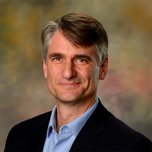 Headshot photo of Craig Kaplowitz