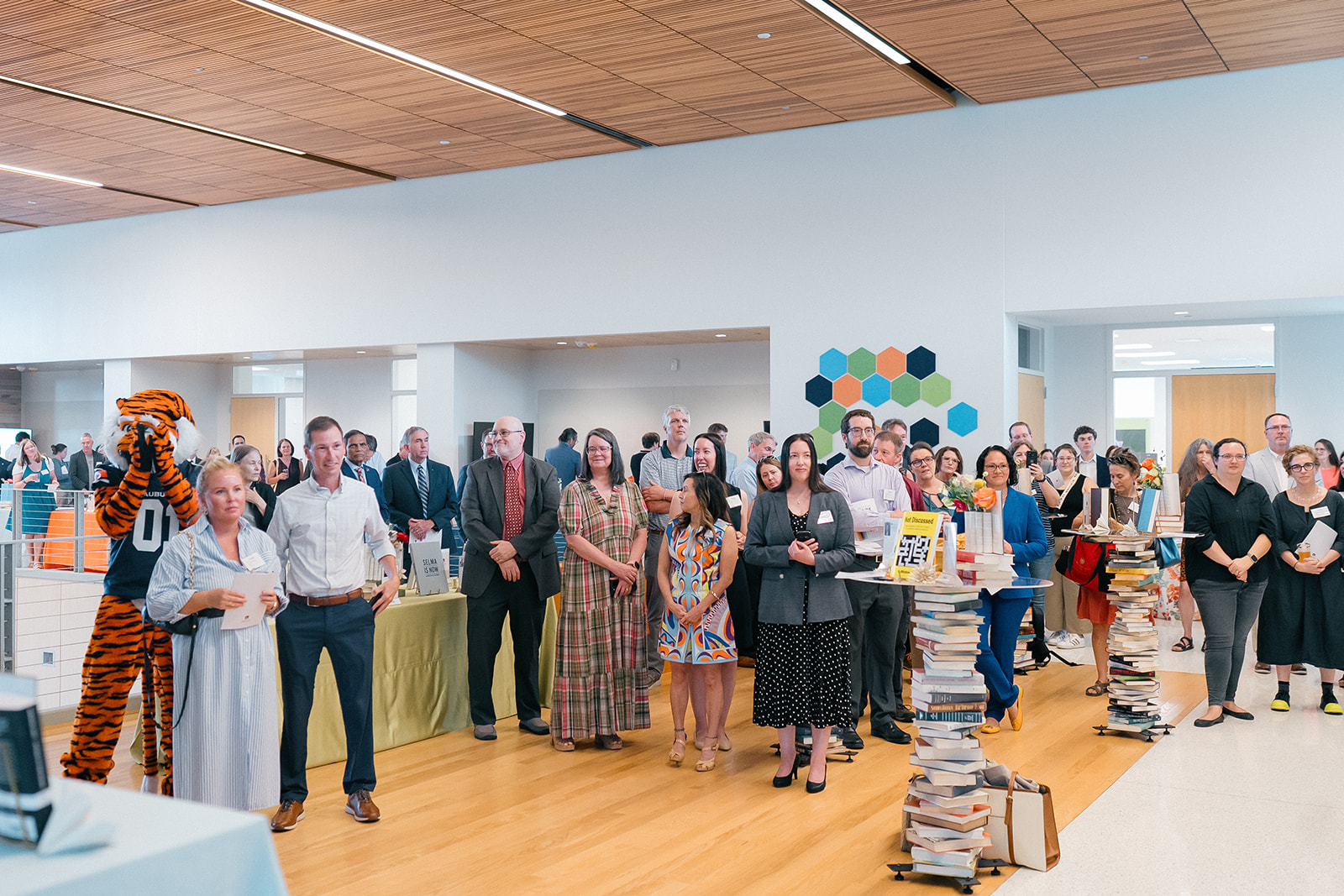 Promotion and Tenure 2024-2025 attendees listening to speakers