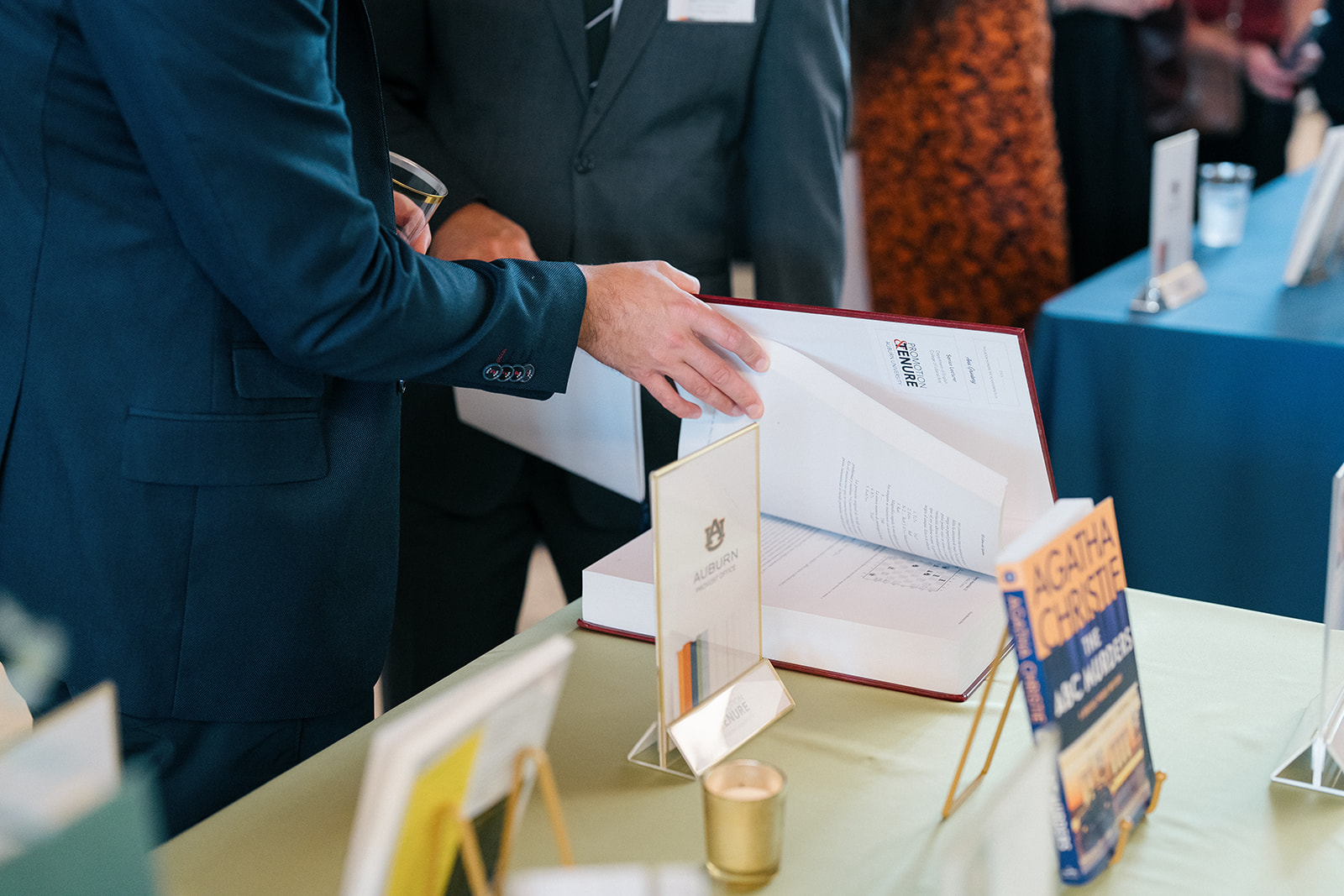 Promotion and Tenure 2024-2025 attendees reading