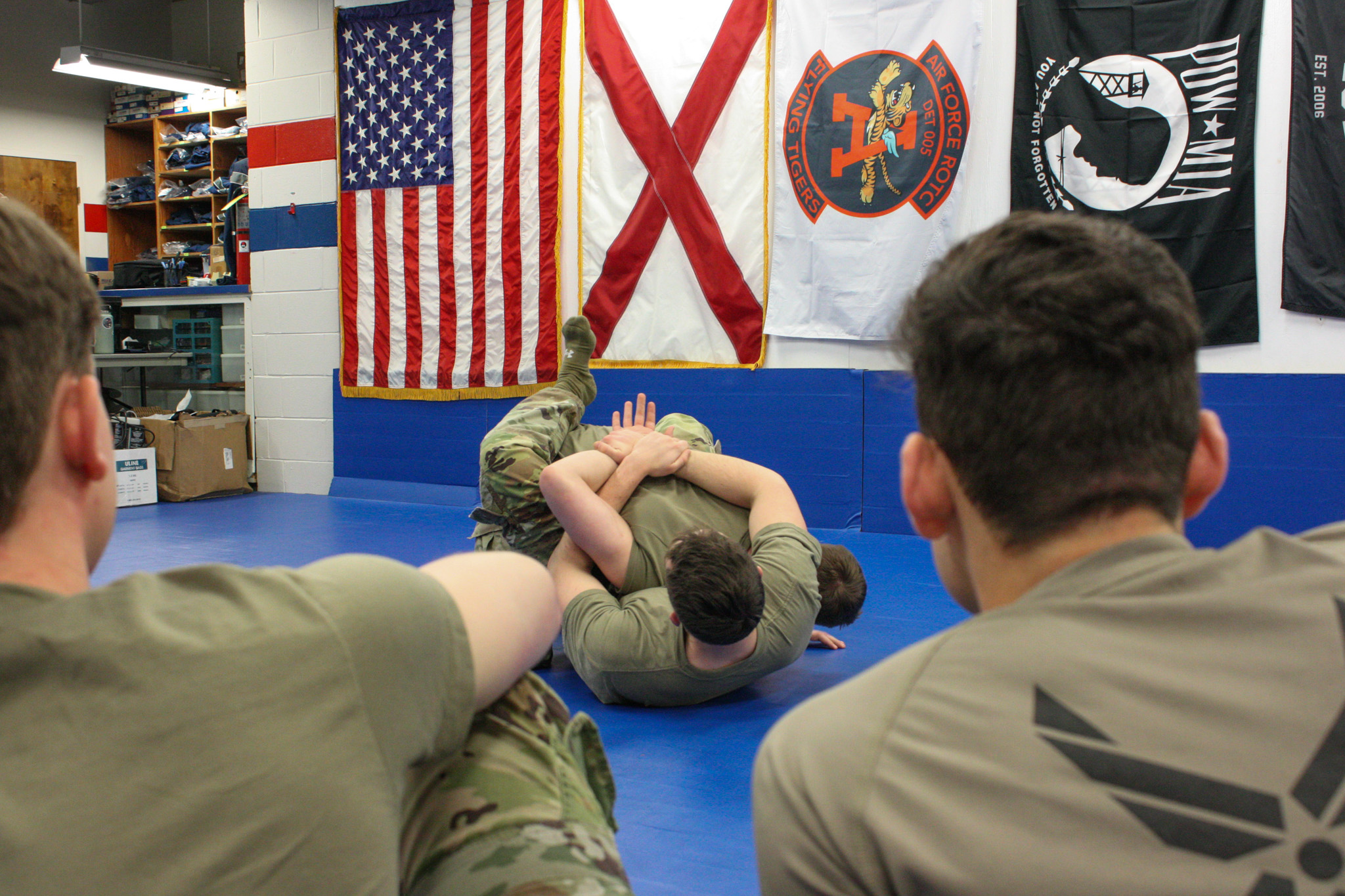 Image of cadets demonstrating combatives moves.