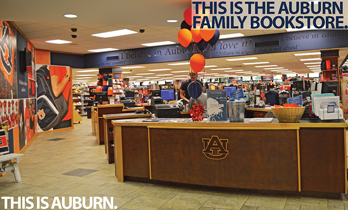 This Is The Auburn Family Bookstore. Student interacting with cashier image.