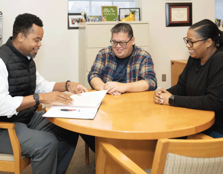 Three people at a table