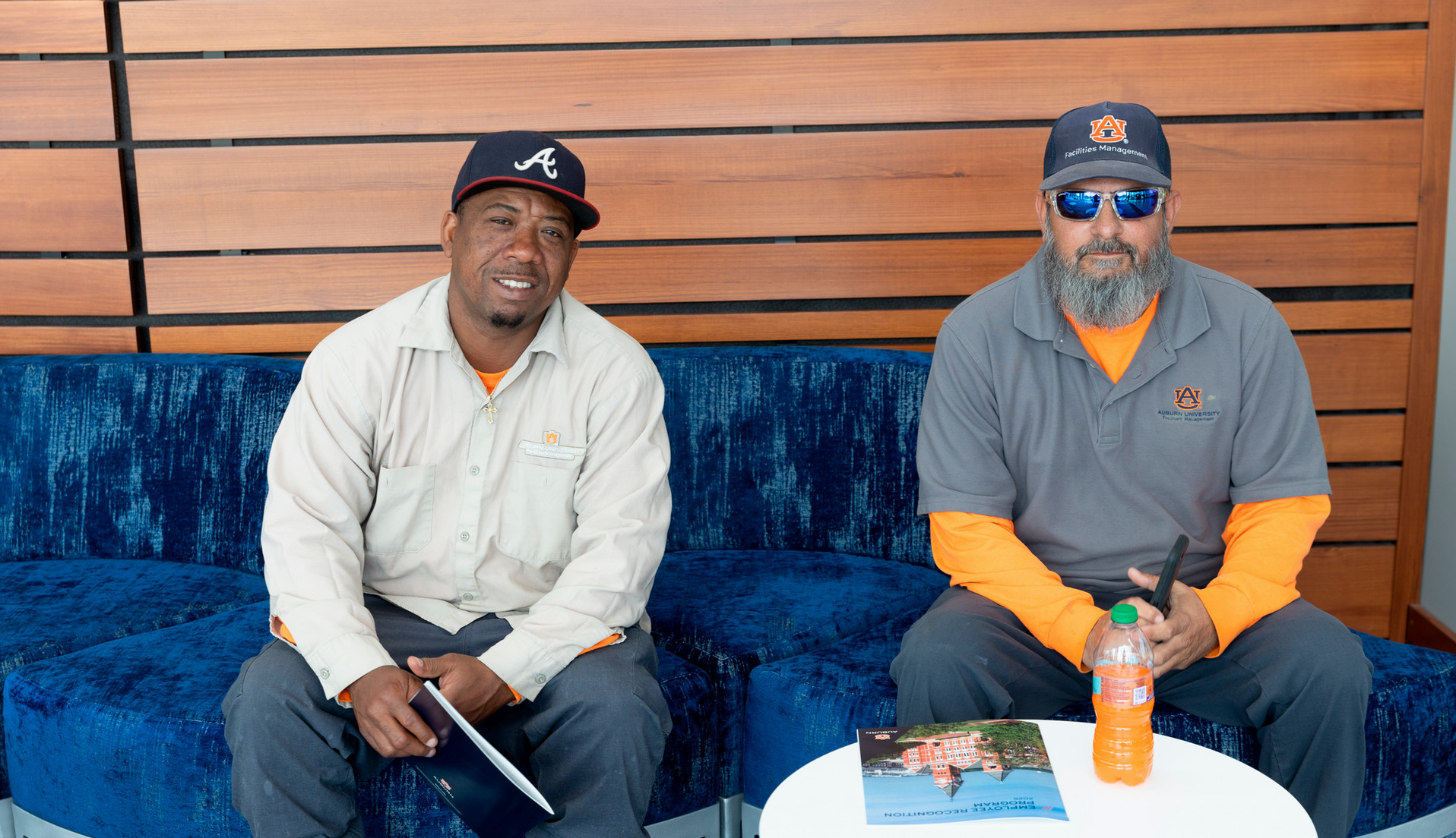 Two men sitting down
