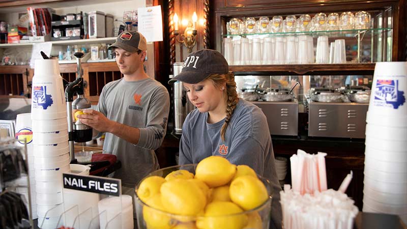 People working at Toomer's Drugs store
