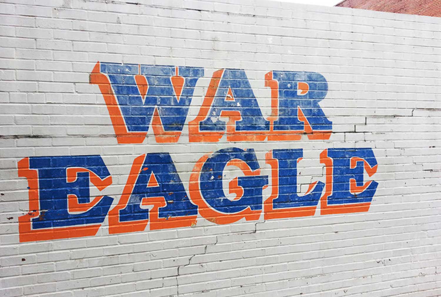 A white brick all with the words War Eagle