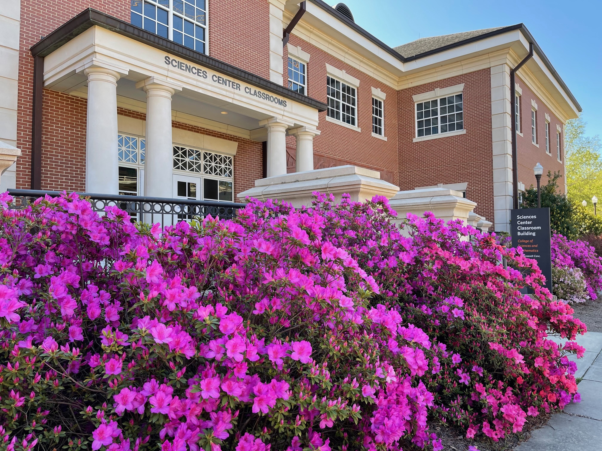 SCC with Azaleas blooming in front of the building