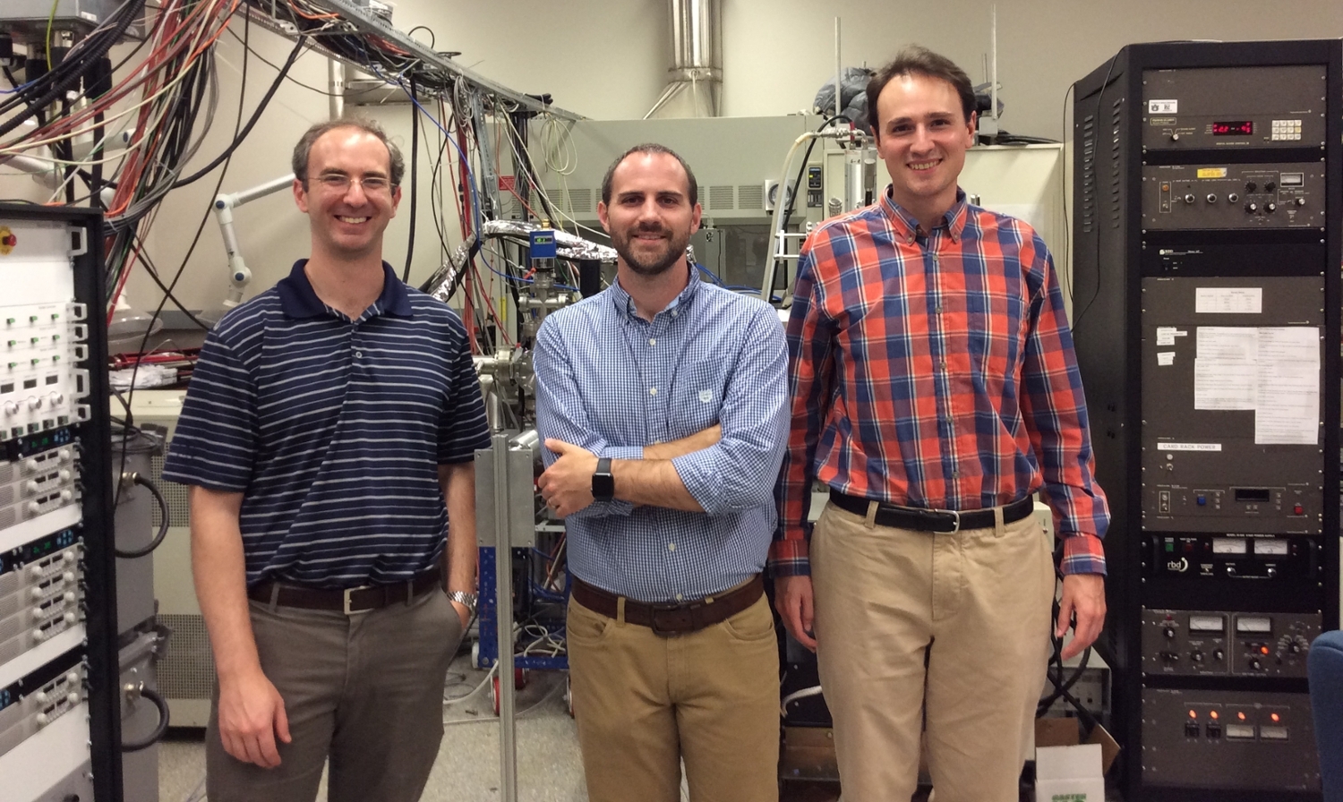 Left to right:  Dr. Ryan Comes, Physics, Dr. Byron Farnum, Chemistry,  and Miles Blanchet, Graduate Student, Physics, in the FINO Lab.