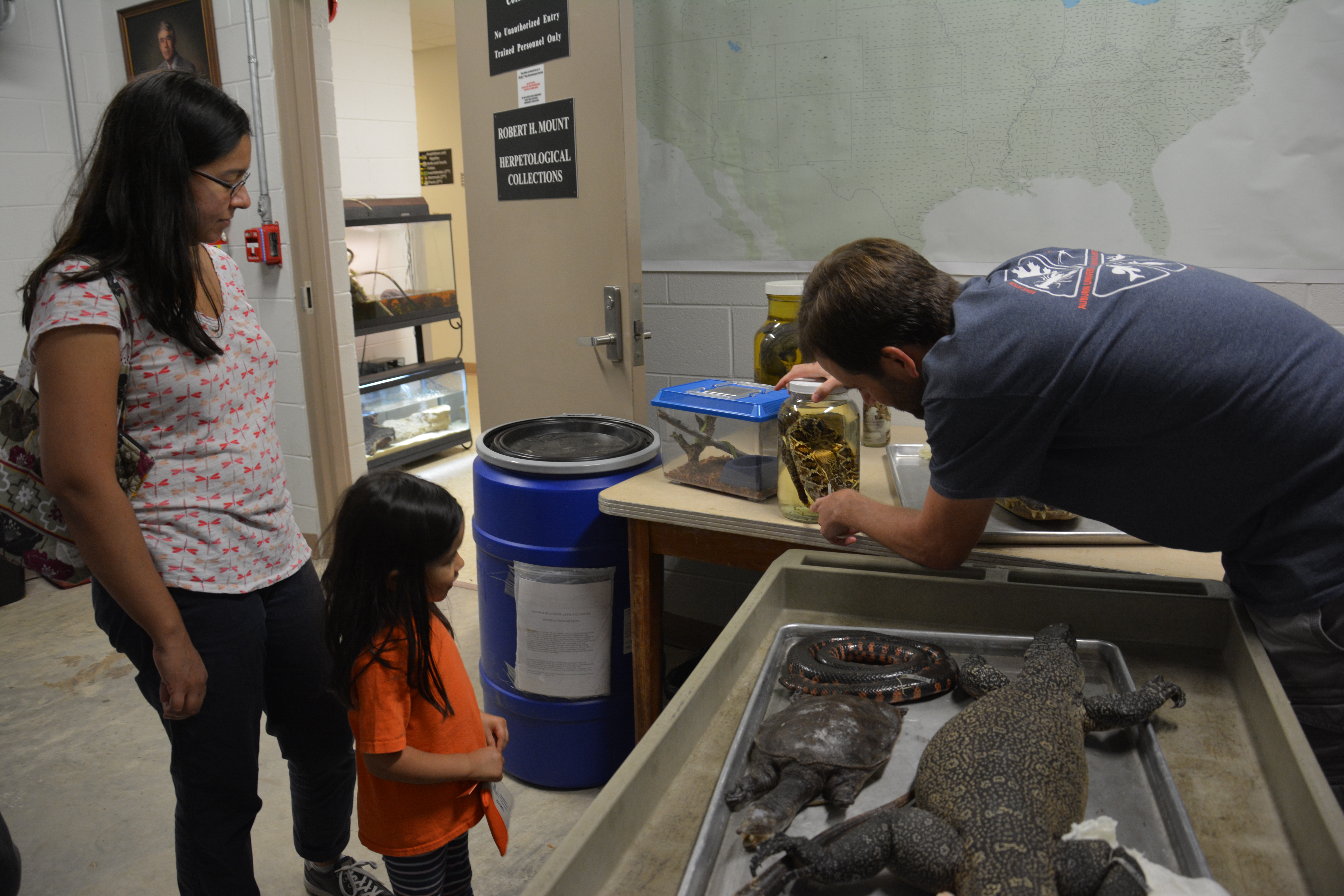 Dr. Daniel Warner shares details about specimens at this year's open house.