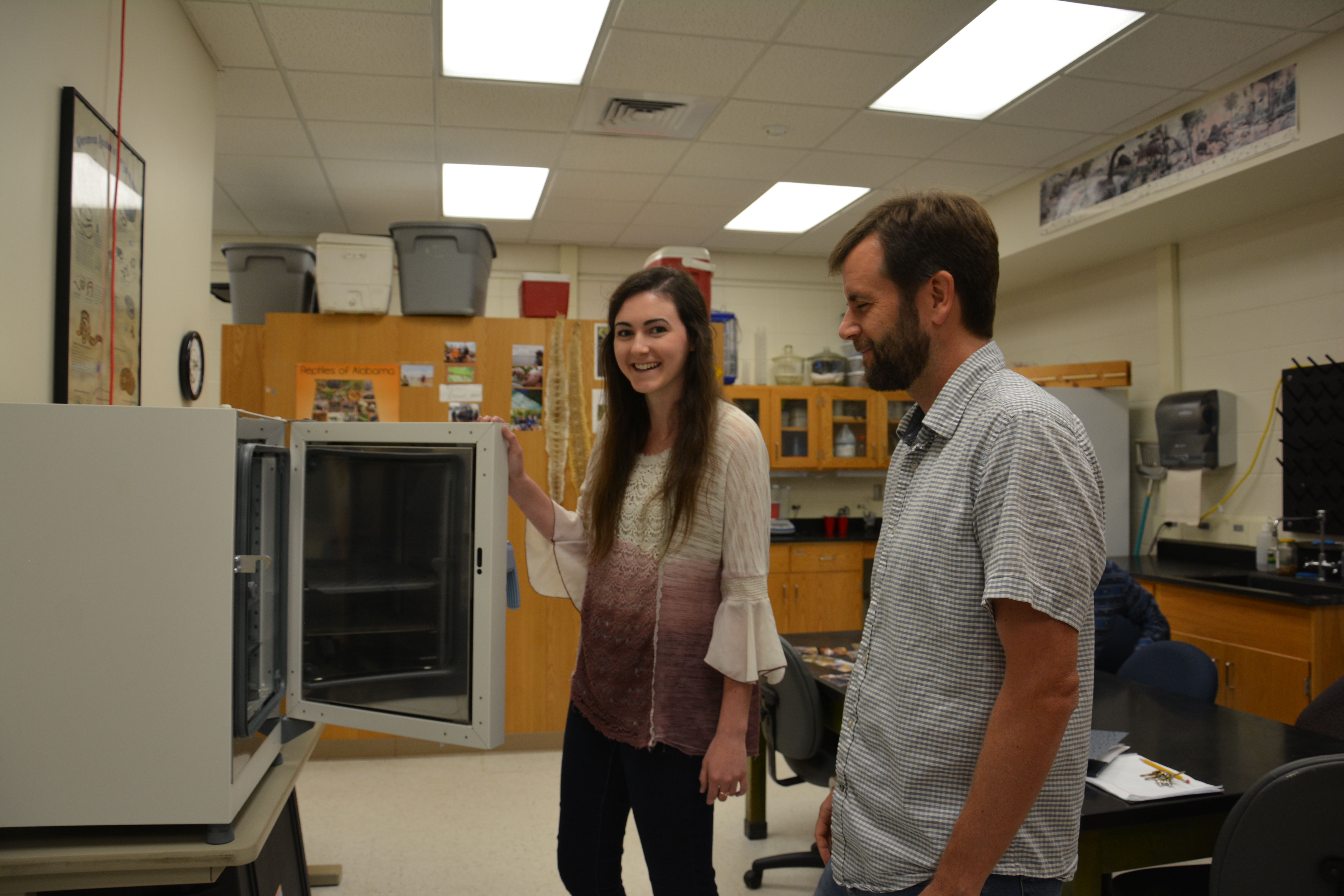 Dr. Warner with Kaitlyn Murphy, a Ph.D. student, in his laboratory.