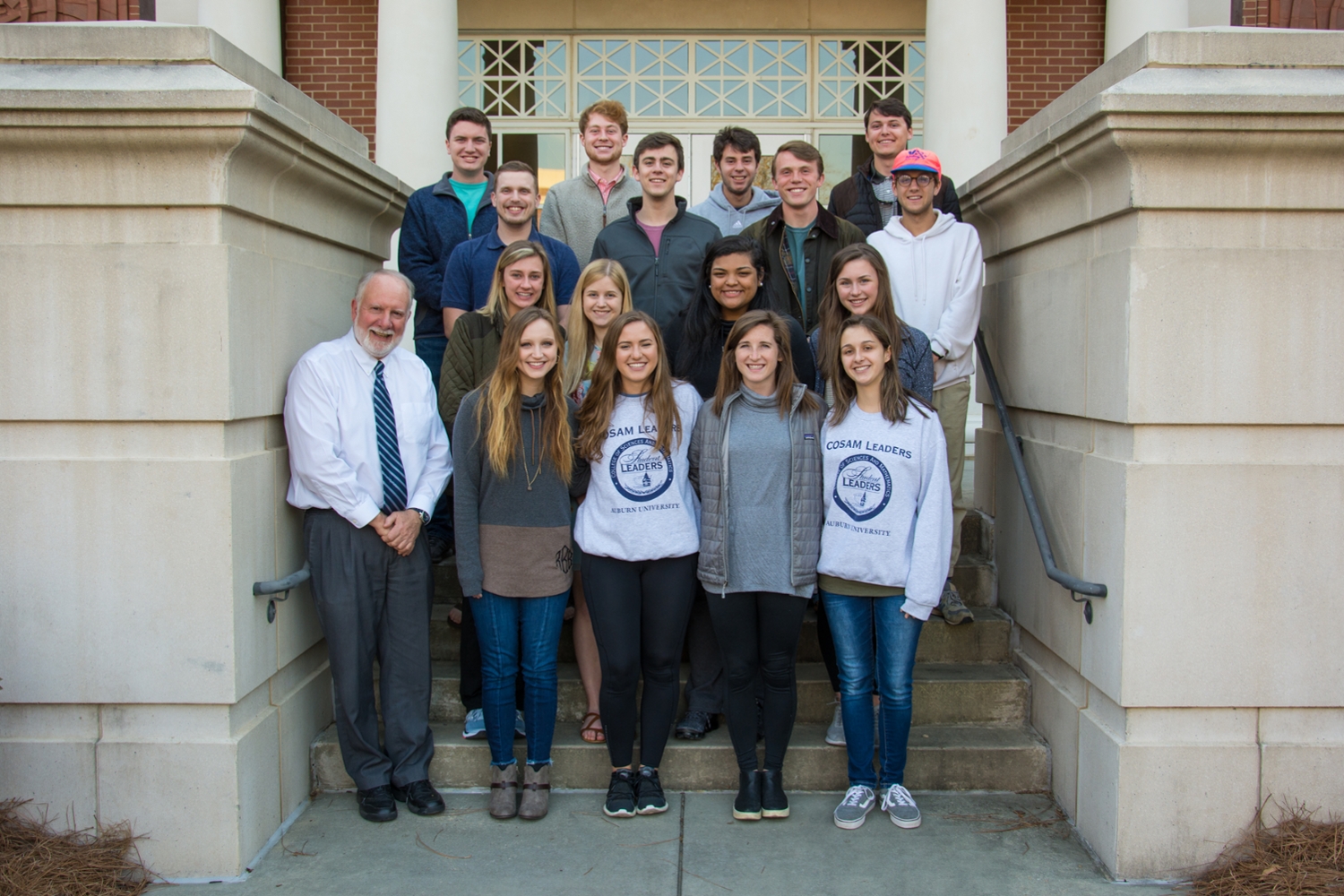 The 2019 - 2020 COSAM Leaders with Dr. Jack Feminella on the steps of the Sciences Classroom Center. 
