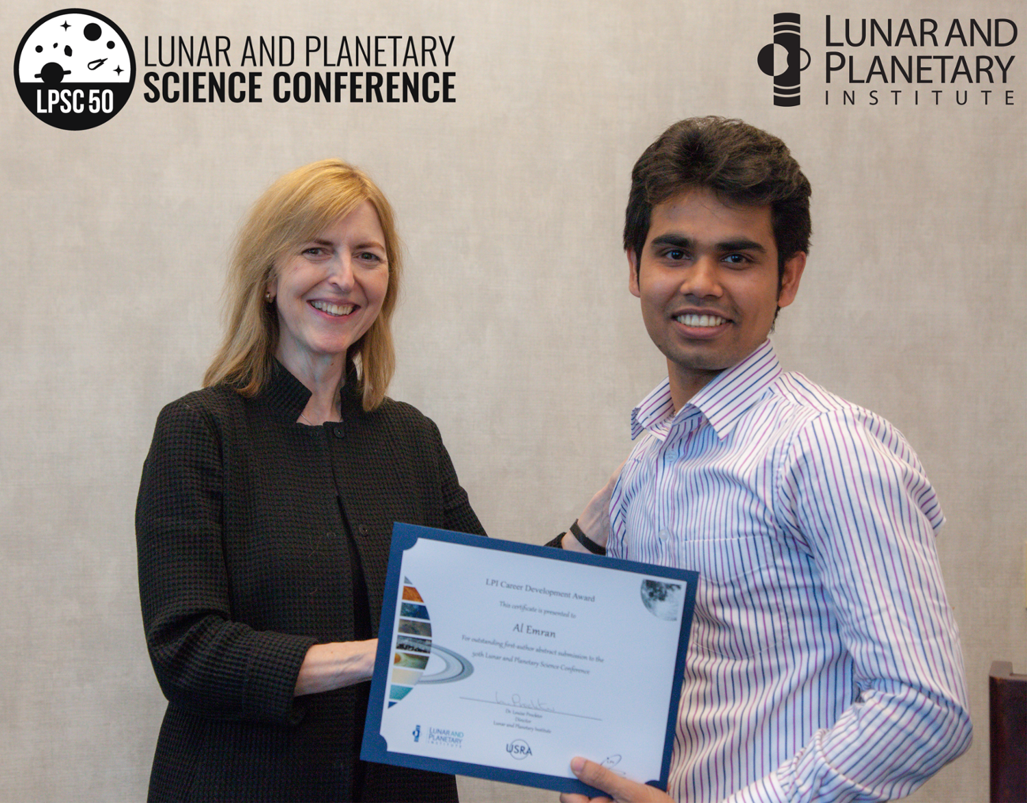 Al Emran receiving the 2019 Lunar and Planetary Institute Career Development award for 2019.