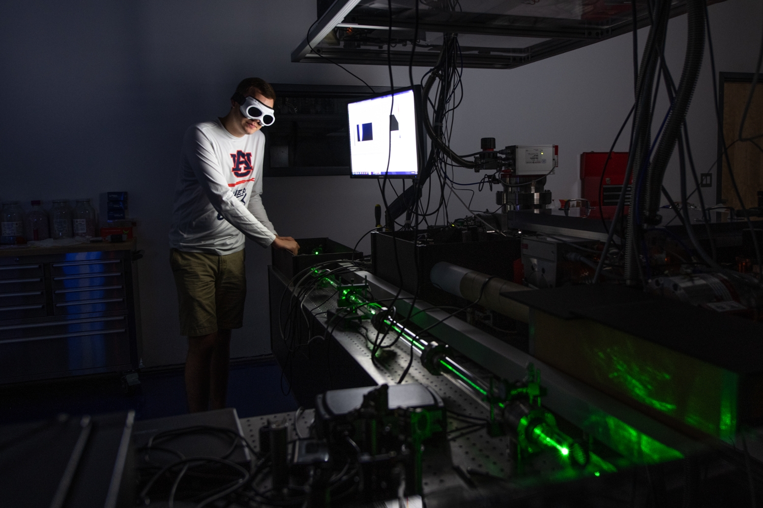 Brady Unzicker is seen conducting hands-on research in a lab.