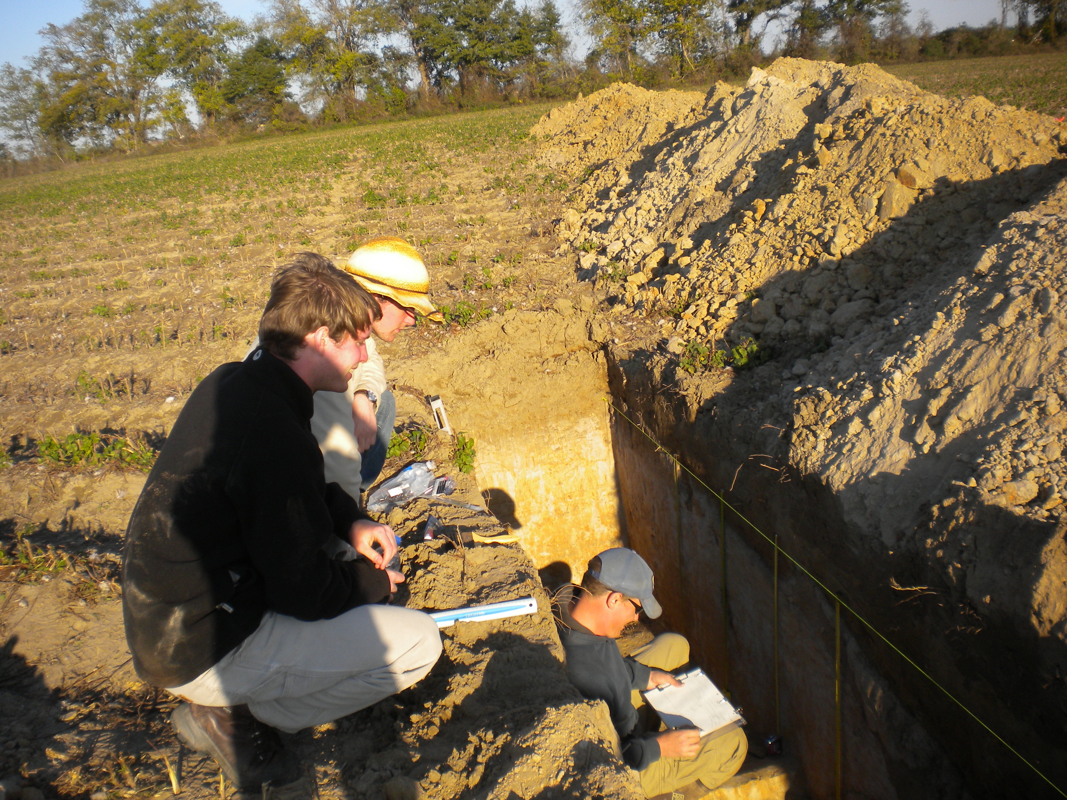 This is a trench dug into a liquefaction sand blow found in the New Madrid Seismic Zone in the central U.S. One student is an undergrad (has the farmer’s hat) and two are graduate students.
