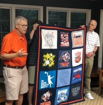 Dr. Wit and Dr. Schneller tell the story of the COSAM Leaders. This quilt consists of COSAM Leader T-shirts that Dr. Wit has collected over the 20 year history of the group.