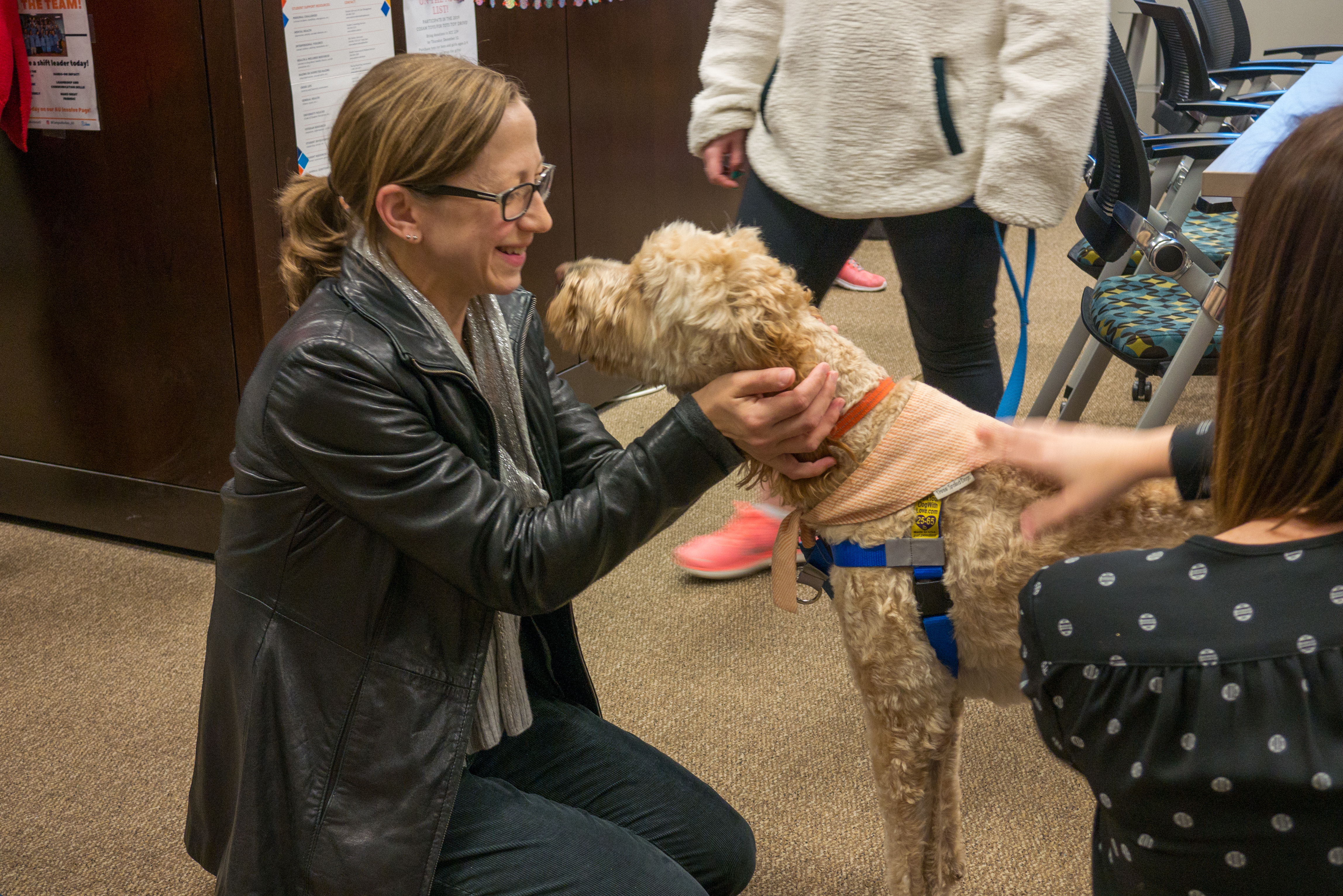 Monica Baziotes from the Office of the Associate Dean for Academic Affairs with Daisy. 