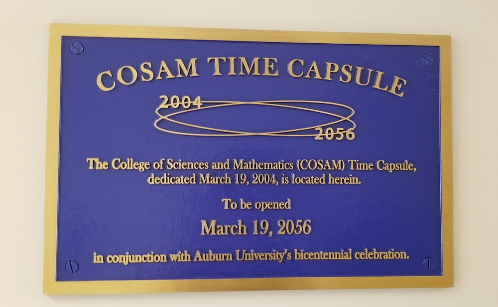 Plaque that reads a time capsule is located in SCC. 
