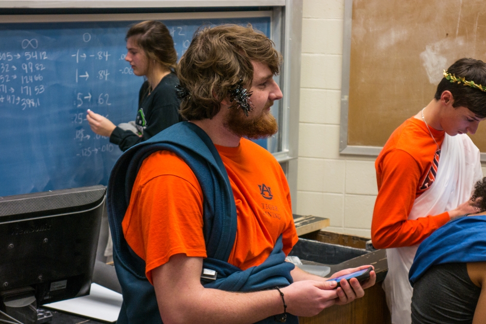 Auburn students learning limits by consulting the ancient Oracle.