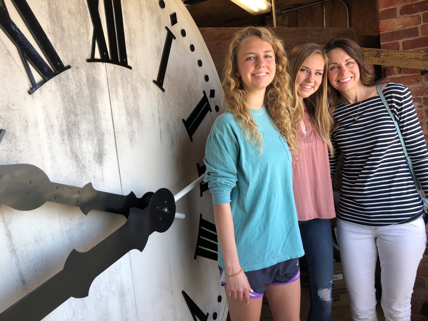 Melea Horton with her two daughters in the Samford Hall Clock Tower