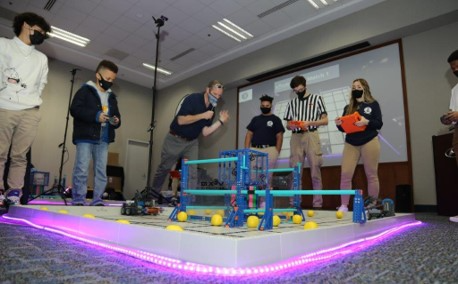 The zone for the robotics competition illuminated at the HIRE Robotics Event on Jan. 28.