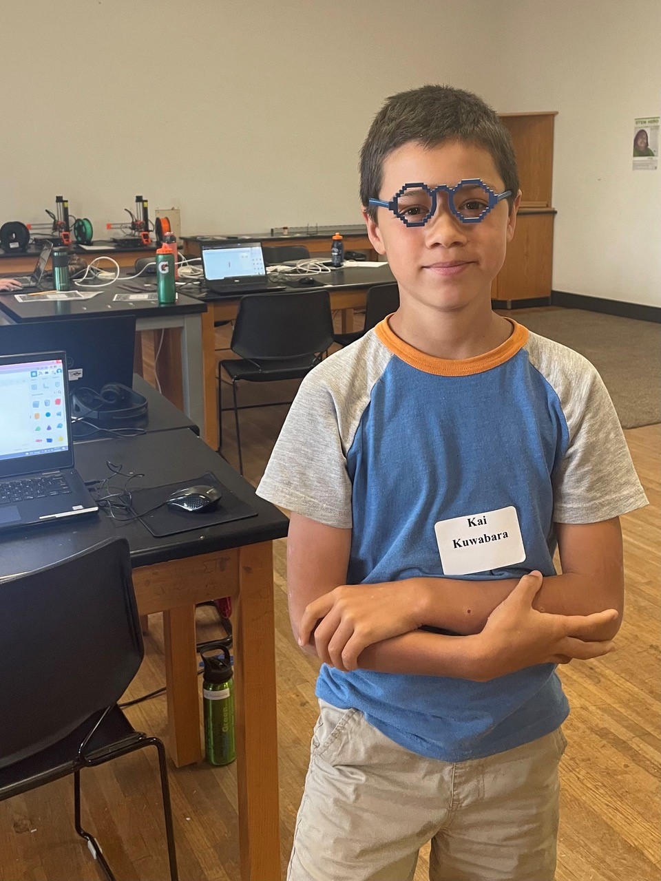 A student wearing 3D printed glasses
