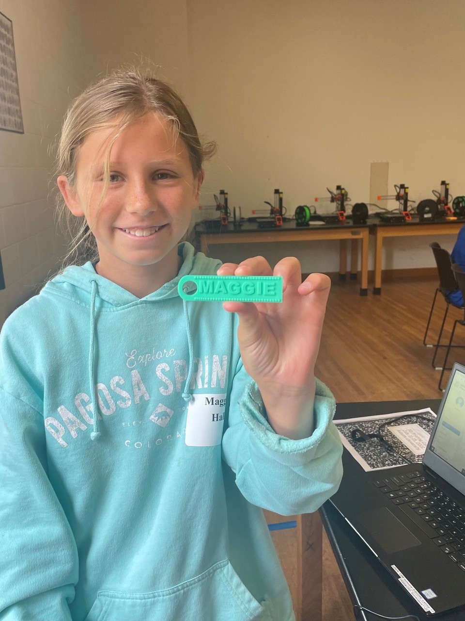 Maggie Hall used Tinkercad shortcuts to design a personalized keychain at SCORE’s introductory 3D printing and design camp.