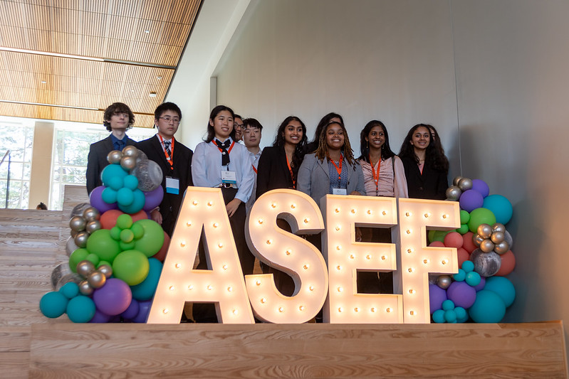 ASEF Group photo with sign