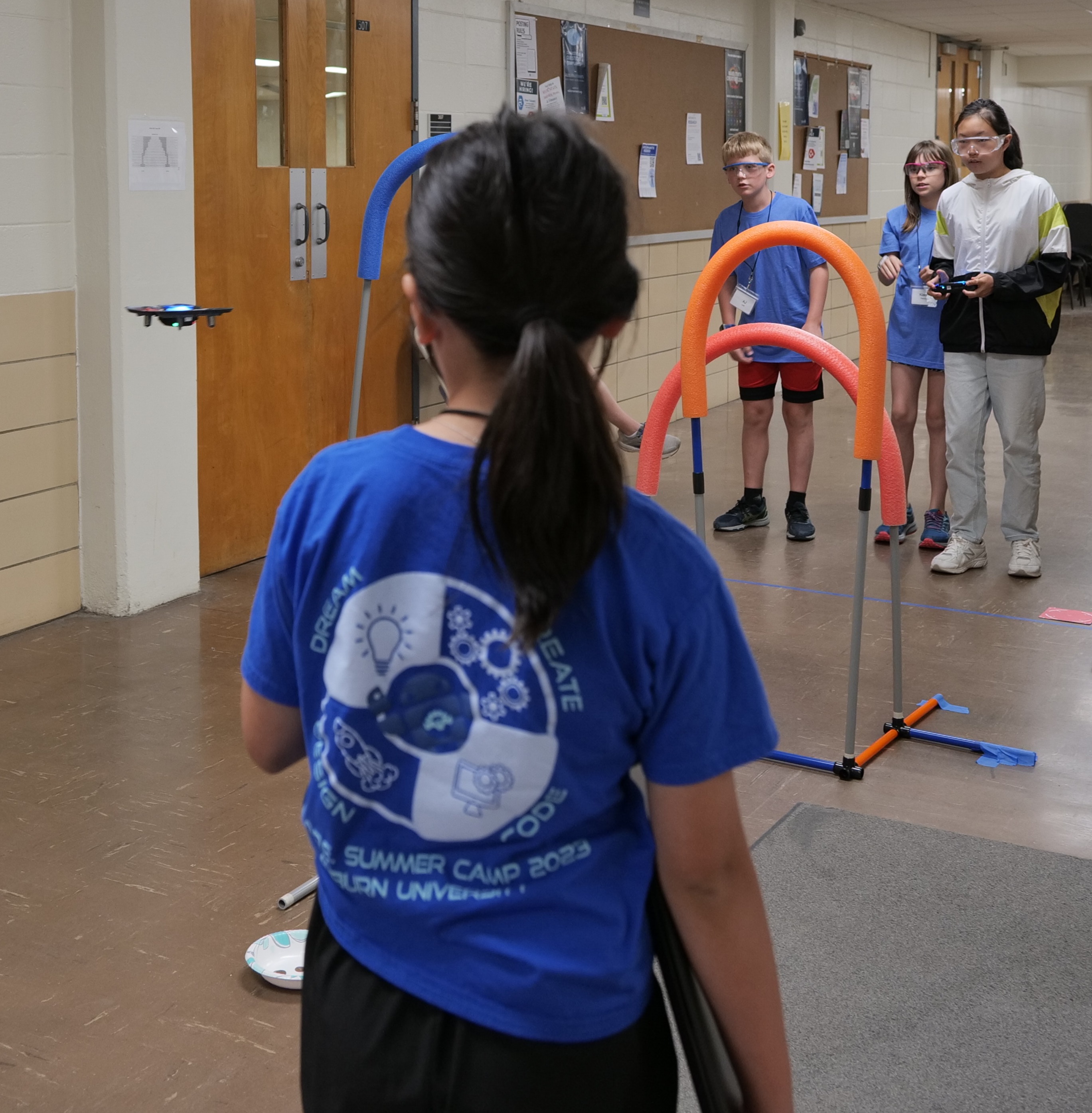 SCORE Summer Spotlight: Students take flight and operate drones through obstacle courses