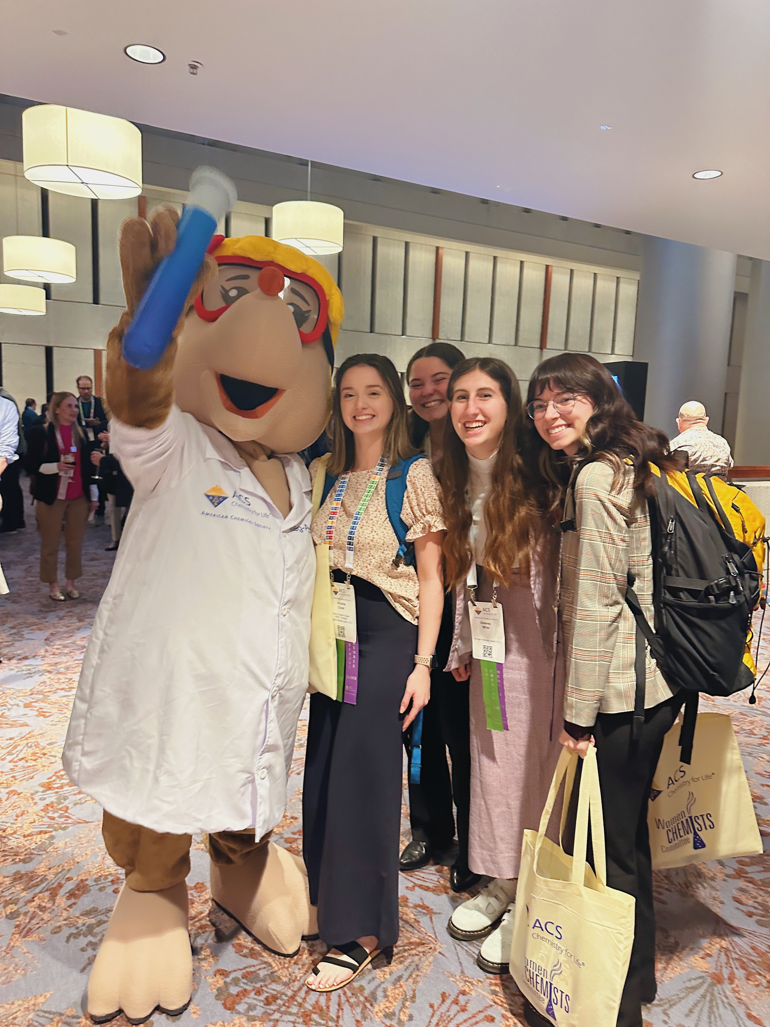 The ACS mascot Prof. Molenium hanging out with students at the ACS Leadership Institute.