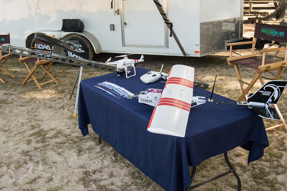 A table with various styles of drones on it.