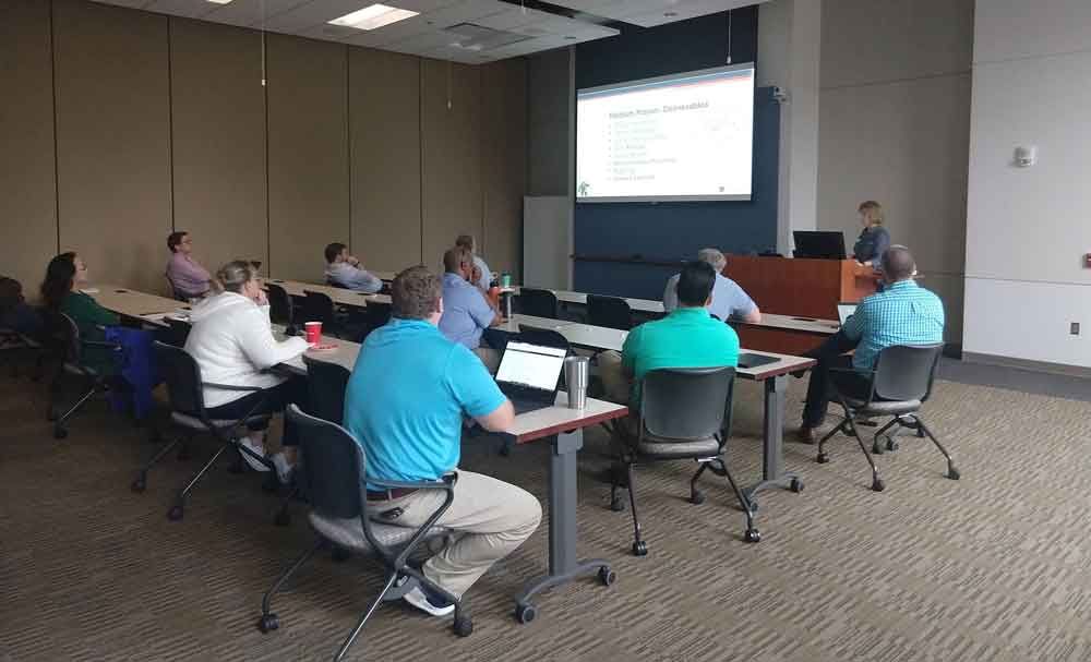 Employees attending Project Management Training