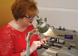 Lady at sewing machine