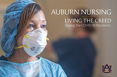 Woman wearing scrubs, hairnet, and mask in foreground with words 'Auburn Nursing - Living the Creed during the COVID-19 Pandemic' to the side.